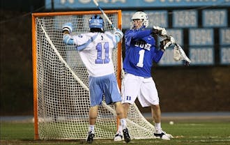 The No. 17 Duke men's lacrosse team upset No. 6 UNC 11-8 at Fetzer Field in Chapel Hill. Junior Brendan Fowler won 17-of-23 faceoffs while Jordan Wolf added three goals and an assist.