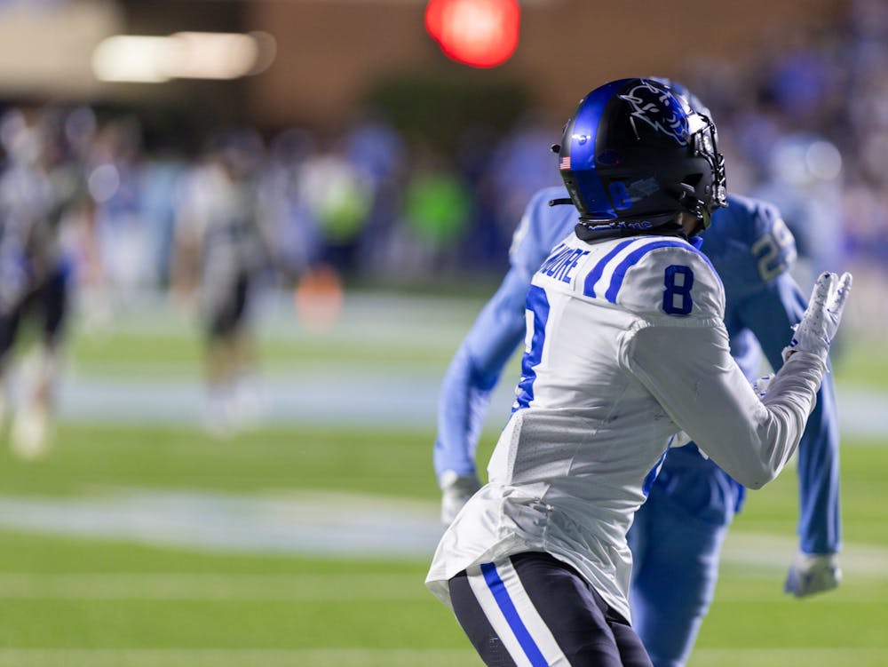 Jordan Moore prepares to receive a pass from Grayson Loftis during Duke's Saturday defeat to North Carolina — a pass that gave the Blue Devils an unlikely fourth-quarter lead.