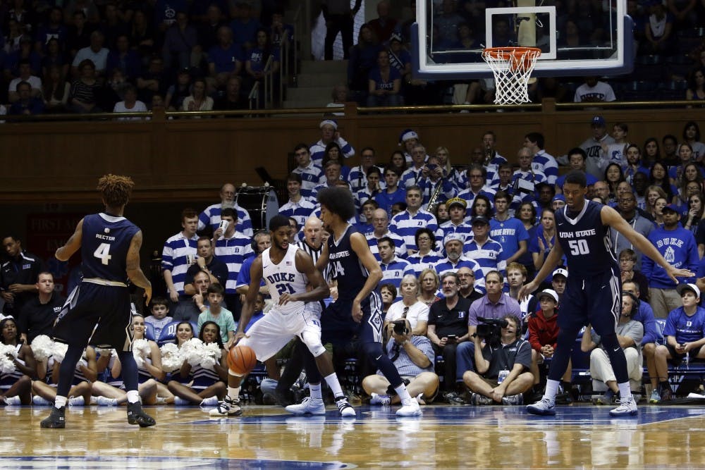 Senior Amile Jefferson used a flurry of post moves to reach double-figures Sunday against Utah State.
