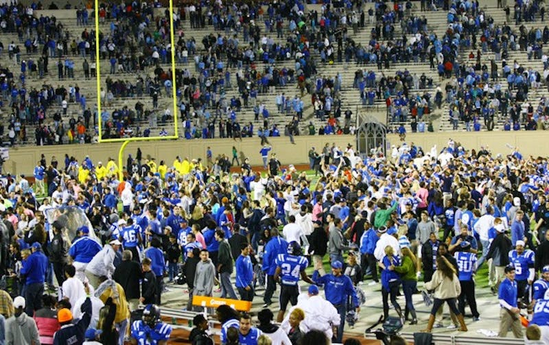 Students stormed the field after Duke’s bowl-clinching win vs. UNC and will get free tickets to the game in Charlotte.