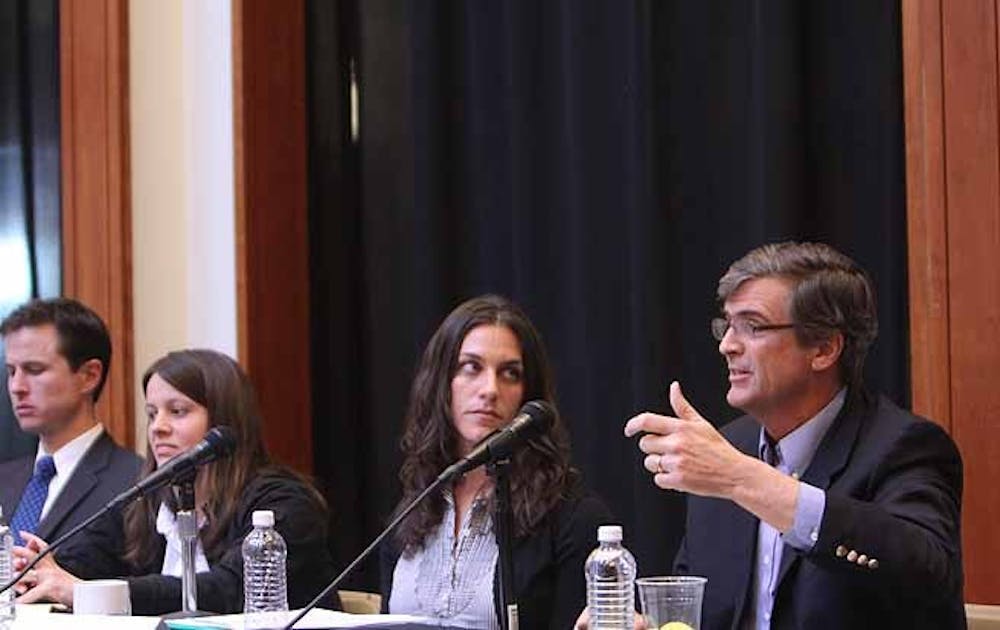 In an event Wednesday at the Sanford School of Public Policy,  a panel of experts discusses the question: who does the government work for?