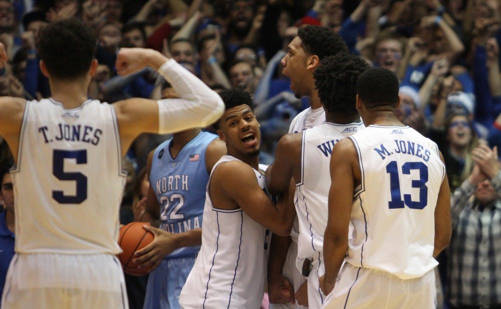 The Blue Devils looked dead in the water in the closing minutes Wednesday, but a furious comeback left Quinn Cook, Tyus Jones and Jahlil Okafor celebrating after the final buzzer.