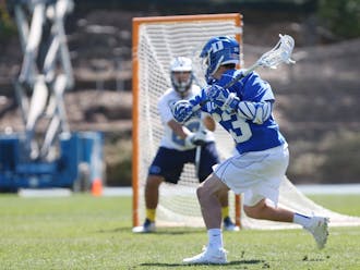 Freshman Justin Guterding scored three goals in his first Duke-North Carolina game, but it wasn't enough as the Blue Devils fell in Chapel Hill.