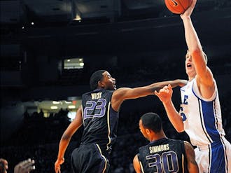 Mason Plumlee scored 12 points to help the Blue Devils to a six-point win in Madison Square Garden.