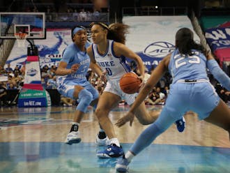 Celeste Taylor drives during the first half of Duke's Friday win against North Carolina at the ACC tournament.