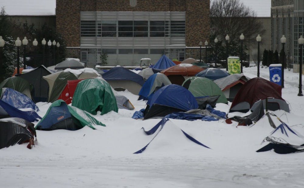 A blanket of snow covers K-Ville tents in 2010. Numerous students join tenting groups each year to secure tickets to the Duke-UNC home basketball game.
