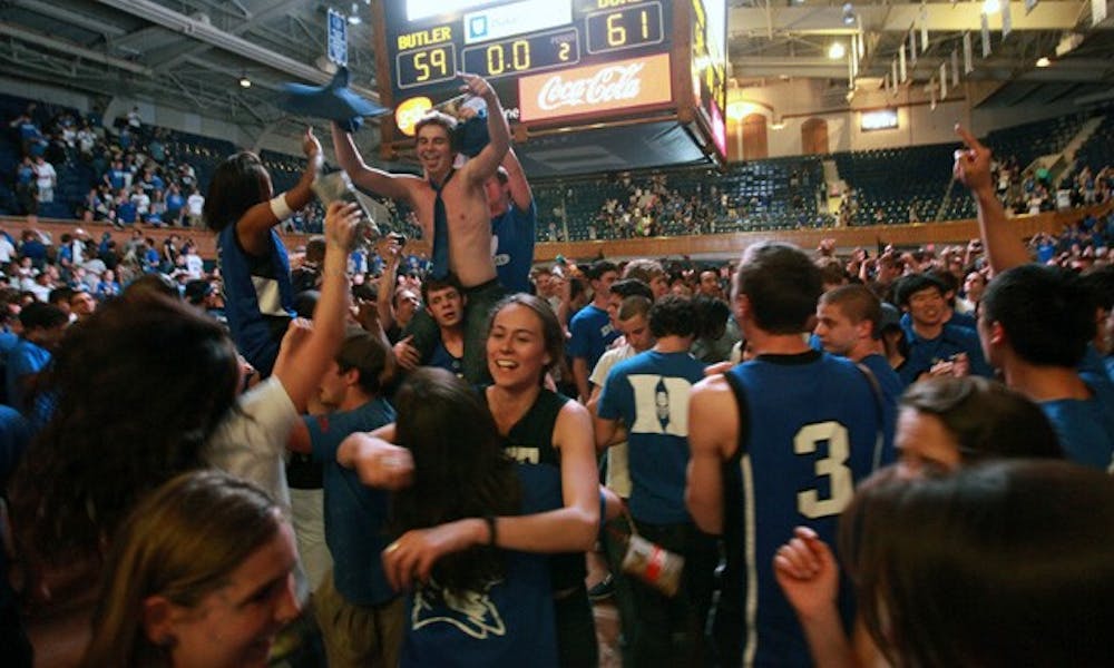 Blue Devils celebrate at the culmination of the Cameron watch party after Duke clinched their fourth national championship.