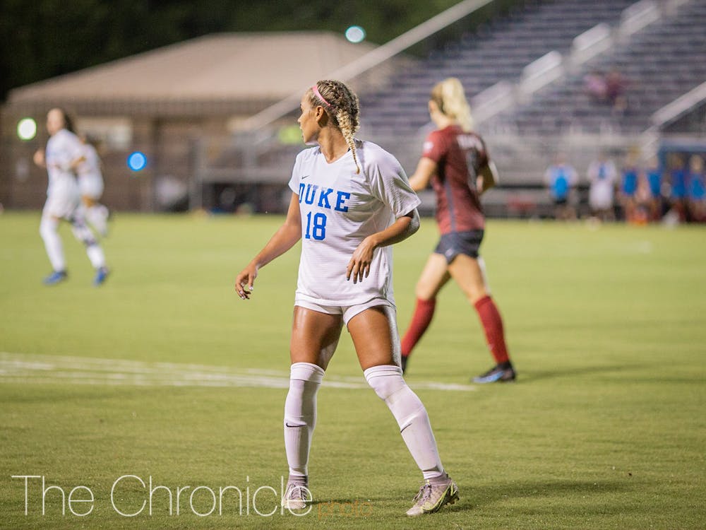 Michelle Cooper scored two goals to break the freshman record for total goals in a season. 