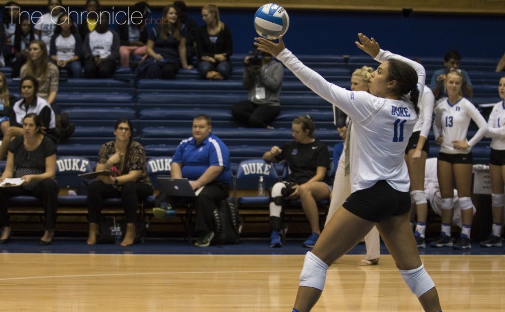 <p>Senior middle blocker Jordan Tucker and the Blue Devils are tied for third in the ACC.&nbsp;</p>