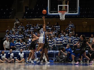 Reigan Richardson puts the ball up during Duke's win against Wake Forest.
