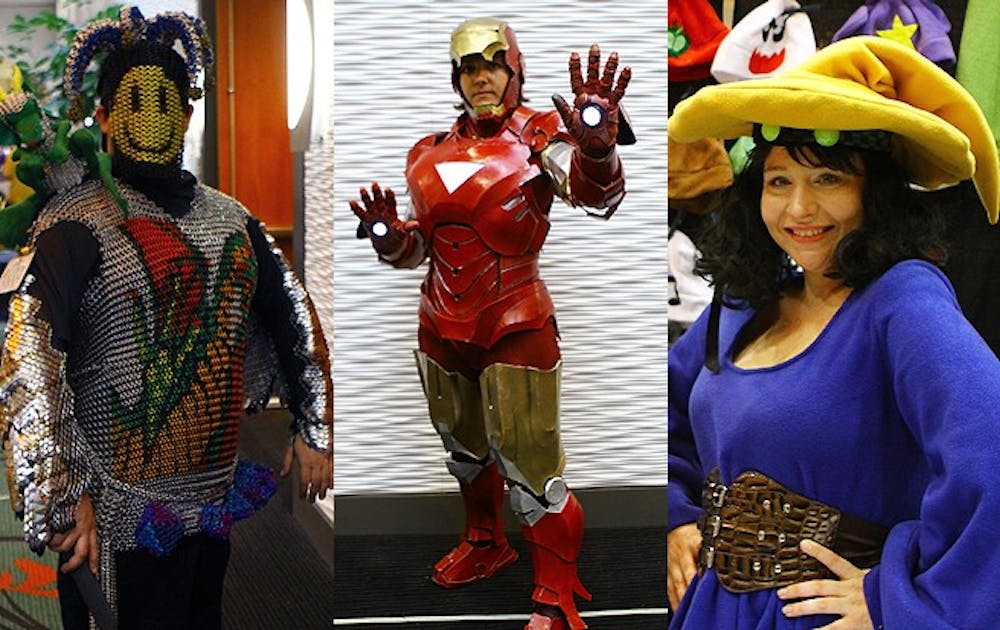 Gamer's Paradise: David O’Brien (left, a massage therapist from Greenville, attended the Escapist Expo in his handmade 37-lb. chainmail costume. Maggie Bennett (center), an artist from Durham, built an Iron Man suit in more than a month of full-time work. Carolann Voltarel (right) peddled Pokemon hats that she made herself.