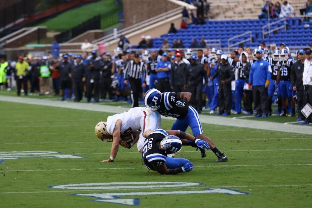 <p>The Blue Devil defense held Boston College's quarterback duo without a completion in the first half and came up big late in the fourth quarter to keep the Eagles at bay.</p>