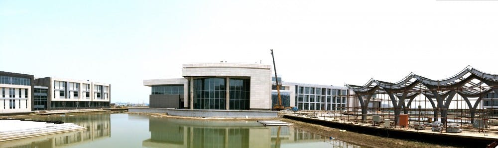 A panoramic view of the back of DKU's academic building and its signature water pavilions.