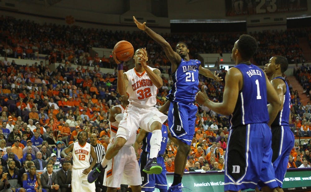 K.J. McDaniels scored 24 points as Clemson topped Duke 72-59 to drop the Blue Devils to 1-2 in ACC play.