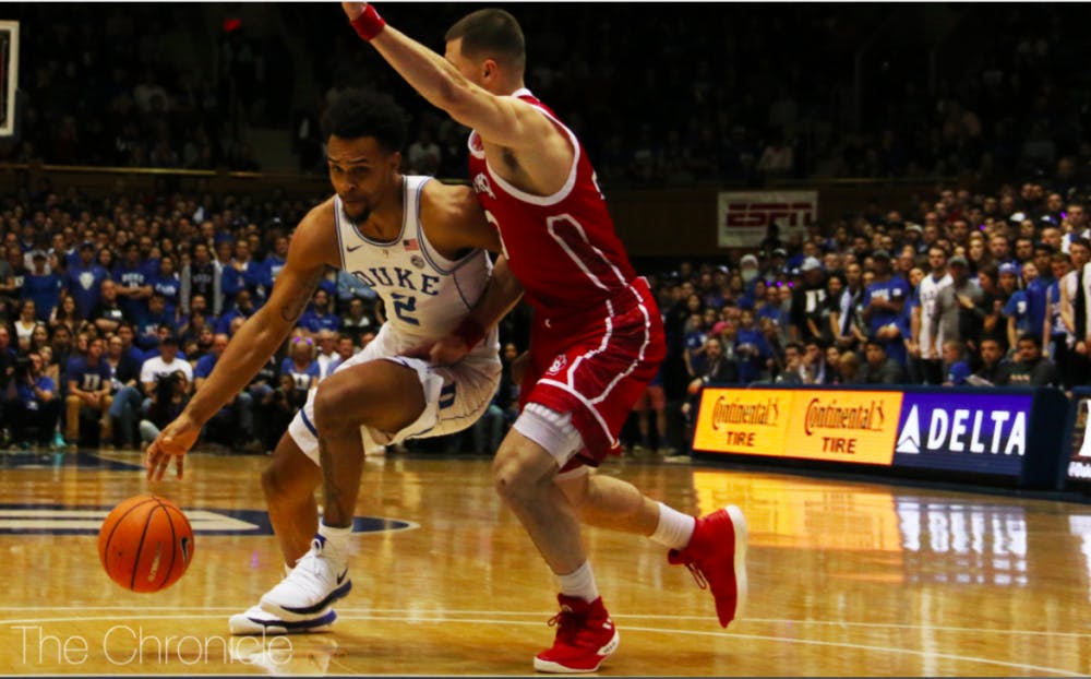 Trent's late three-point play pushed Duke past Indiana. 