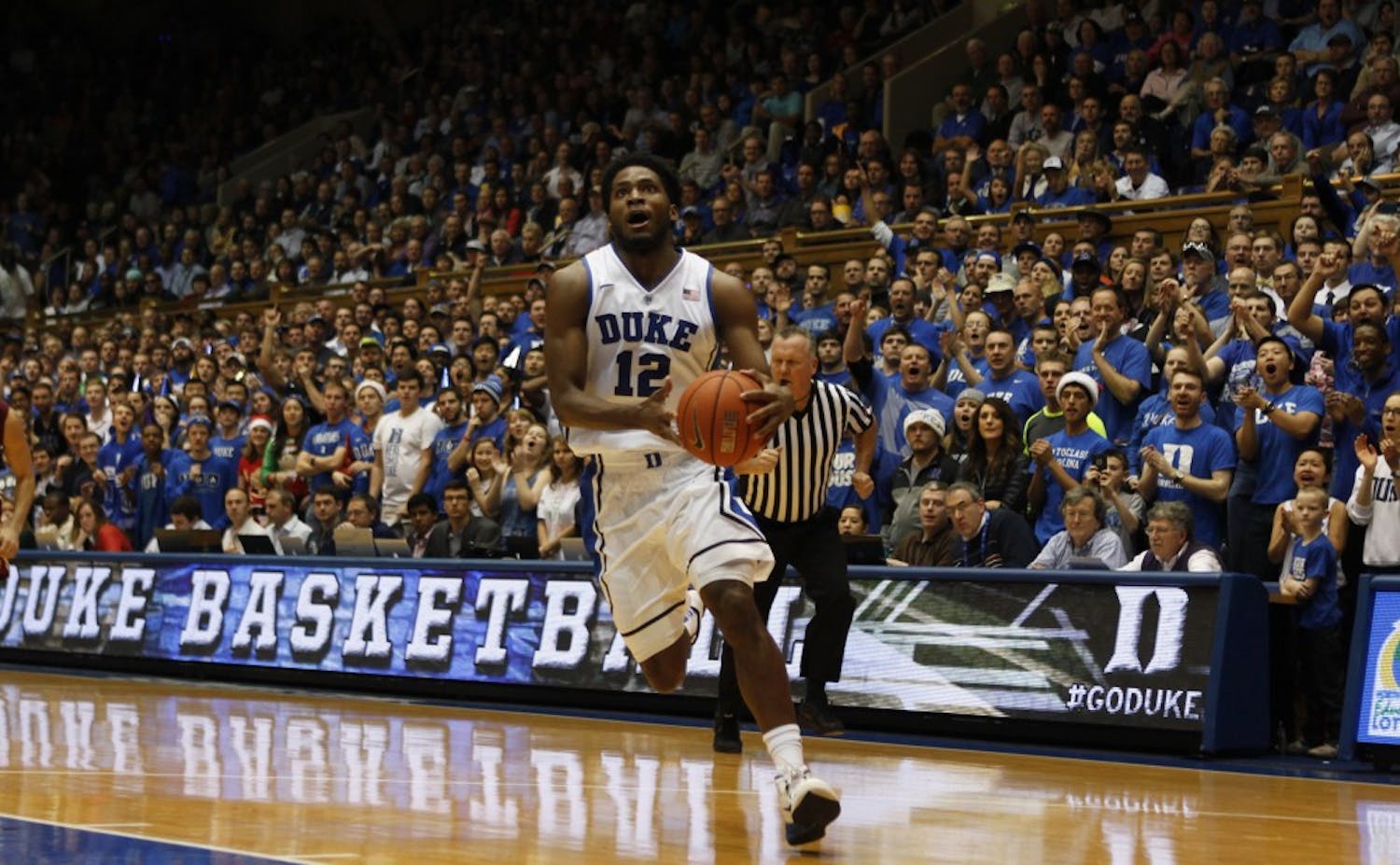 Freshman Justise Winslow got the crowd into the game with a few highlight-reel-worty dunks Monday.