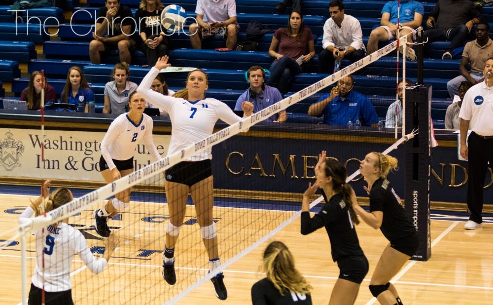 <p>Sophomore Leah Meyer had 12 kills Wednesday night to move the Blue Devils to 3-0 at home in the past week.&nbsp;</p>