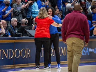 Duke head coach Kara Lawson served as an assistant on Team USA head coach Cheryl Reeve's gold medal-winning 2022 FIBA Women's World Cup team.