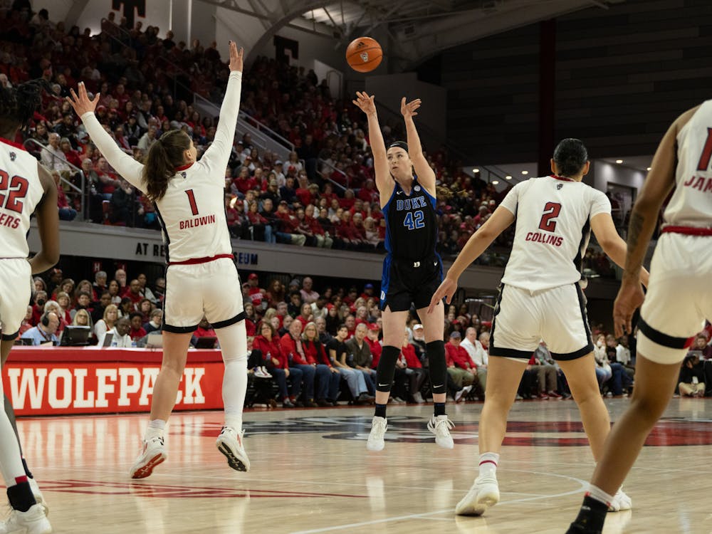 Kennedy Brown lets loose an open three during Duke's loss at N.C. State.