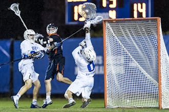 Goalie Mike Adler's save at the buzzer clinched the win for the Blue Devils.