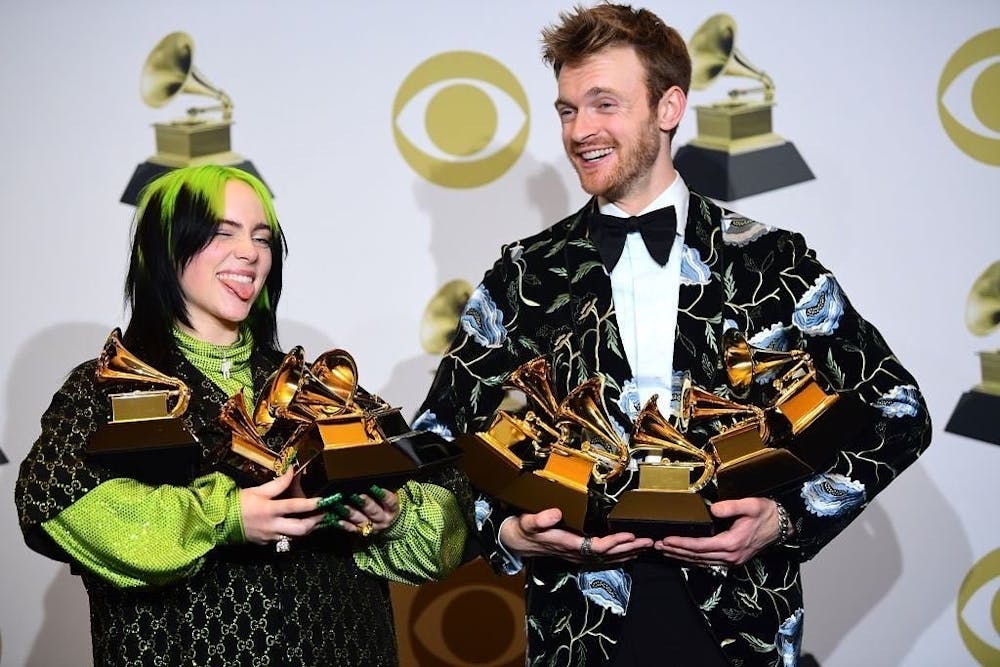 Billie Eilish (pictured with brother and producer Finneas O'Connell) swept the four major categories at the Jan. 26 Grammy Awards.