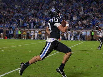 Quarterback Riley Leonard, shown rushing for a score against North Carolina, led Duke to a bowl appearance.