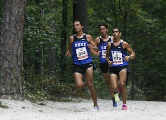 Racing without their top runner, the Blue Devils finished third at the Furman Cross Country Classic.