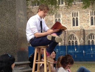 Senior Robbie Florian has been giving daily readings of each of the seven Harry Potter novels under the James B. Duke statue since Nov. 3, 2014.