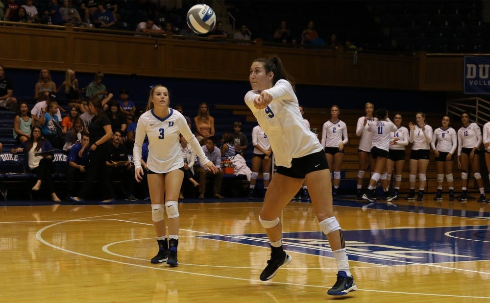 <p>Senior Emily Sklar notched 13 digs and eight kills, but it was not enough to prevent the Blue Devils from falling in straight sets to the No. 20 Wolverines Friday night.</p>