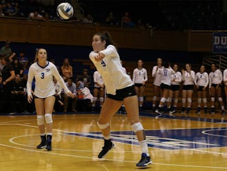 Senior Emily Sklar notched 13 digs and eight kills, but it was not enough to prevent the Blue Devils from falling in straight sets to the No. 20 Wolverines Friday night.