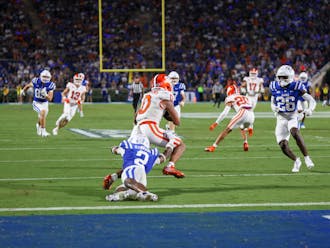 Senior safety Jaylen Stinson lays out for a tackle during Duke's Monday night win against Clemson.