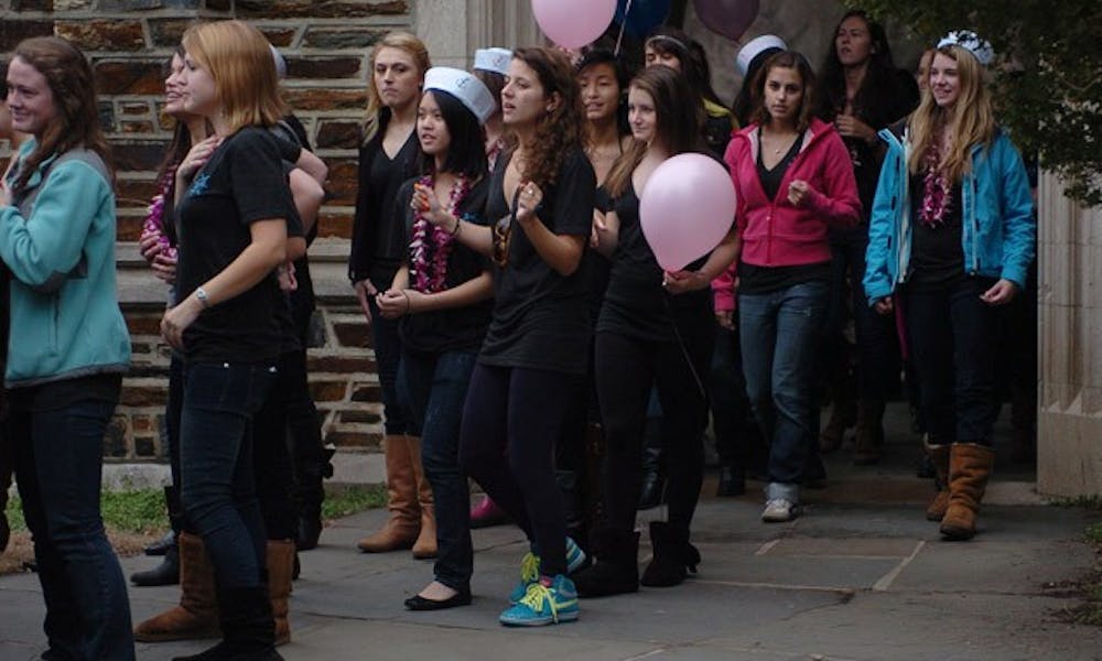 New members of Delta Gamma celebrate their offers during the annual Bid Day Sunday afternoon.