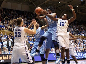 Chelsea Gray battles for a rebound during the first half. Duke handily defeated the University of North Caroline 96-56