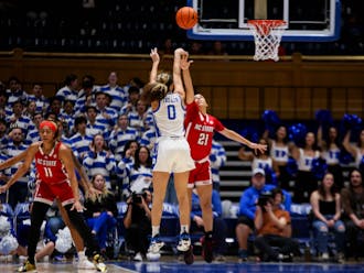 Celeste Taylor (game-high 21 points, six rebounds, five assists) lets loose a 3-point attempt in the first half of Duke's win at Cameron Indoor Stadium.