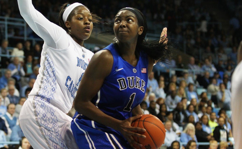 Senior Elizabeth Williams showed her experience Sunday night with a historic game against Duke's arch-rival.