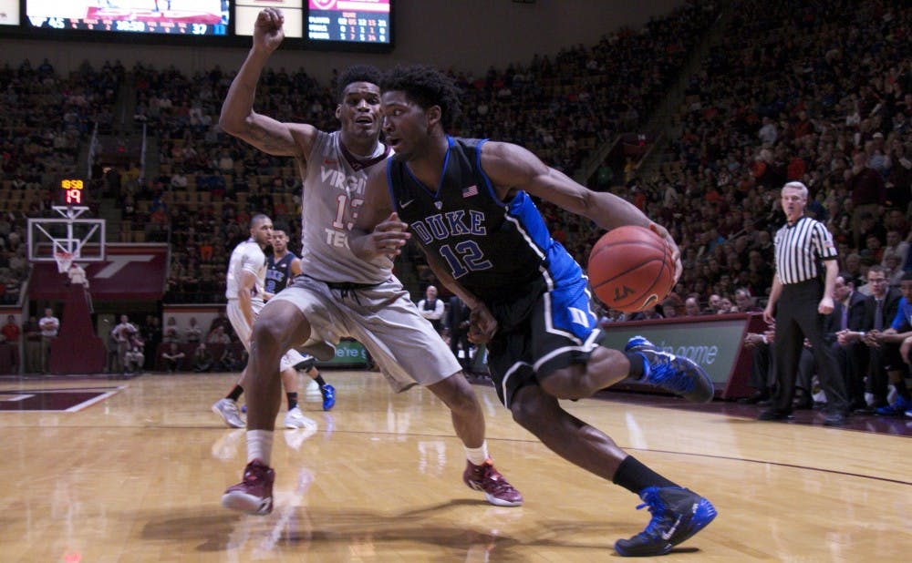 Justise Winslow had 15 points and seven rebounds and made several plays in transition to help Duke escape Virginia Tech and move its winning streak to eight Wednesday night.