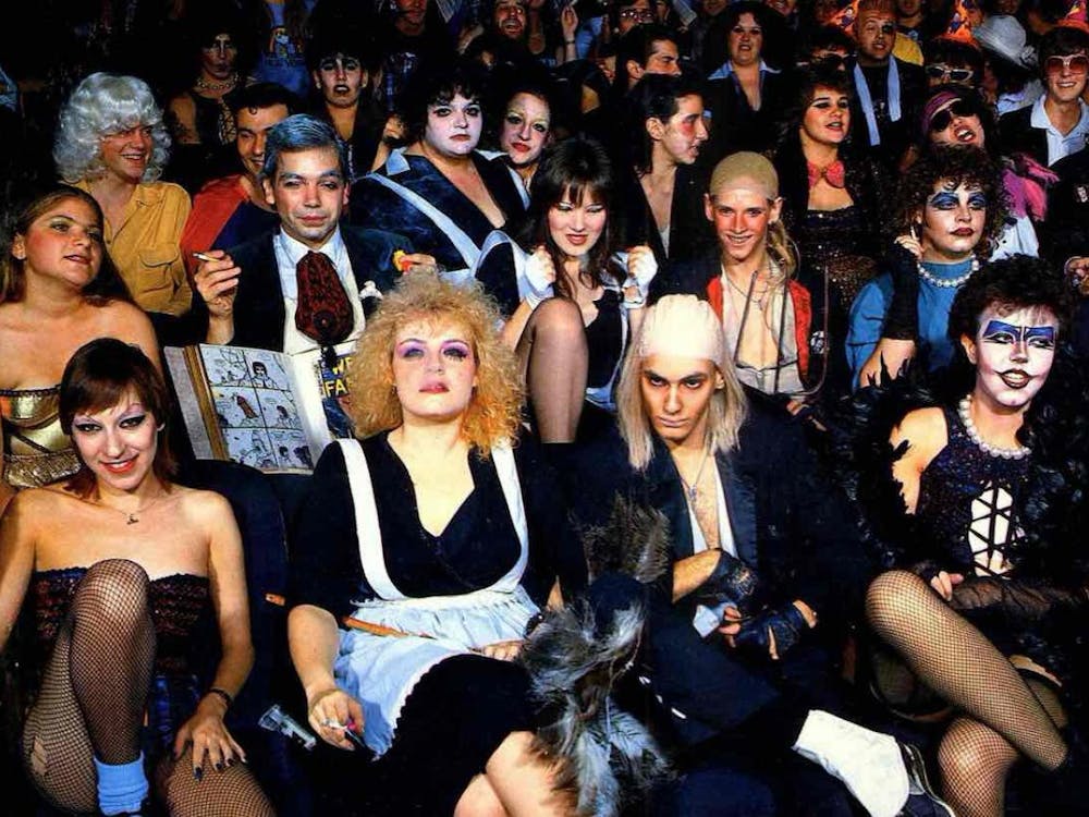 <p>Fans of the seminal cult classic “Rocky Horror Picture Show,” in full costume, at a midnight screening of the film.</p>