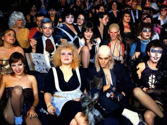 Fans of the seminal cult classic “Rocky Horror Picture Show,” in full costume, at a midnight screening of the film.