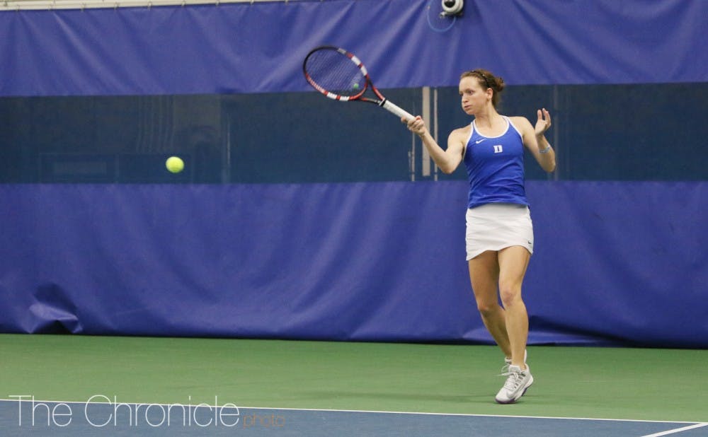 <p>Senior Chalena Scholl clinched the match with a three-set win, delivering Duke's first top-10 win of 2017 in her final home match.&nbsp;</p>