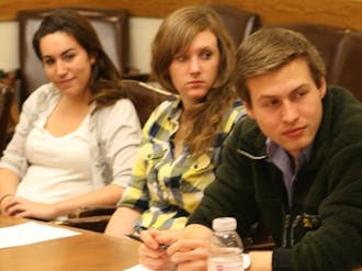Merideth Bajana, Holly Little, and DUU President Zach Perret hear proposals for the reorganization of student group funding at Tuesday’s DUU meeting.