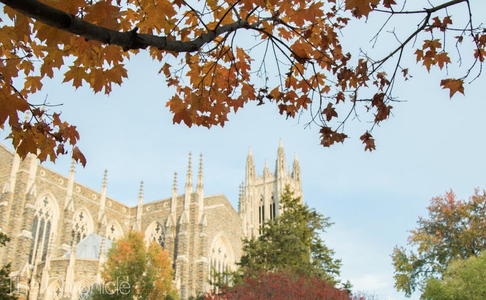 Colorful leaves frame the Duke Chapel on a chilly fall day.