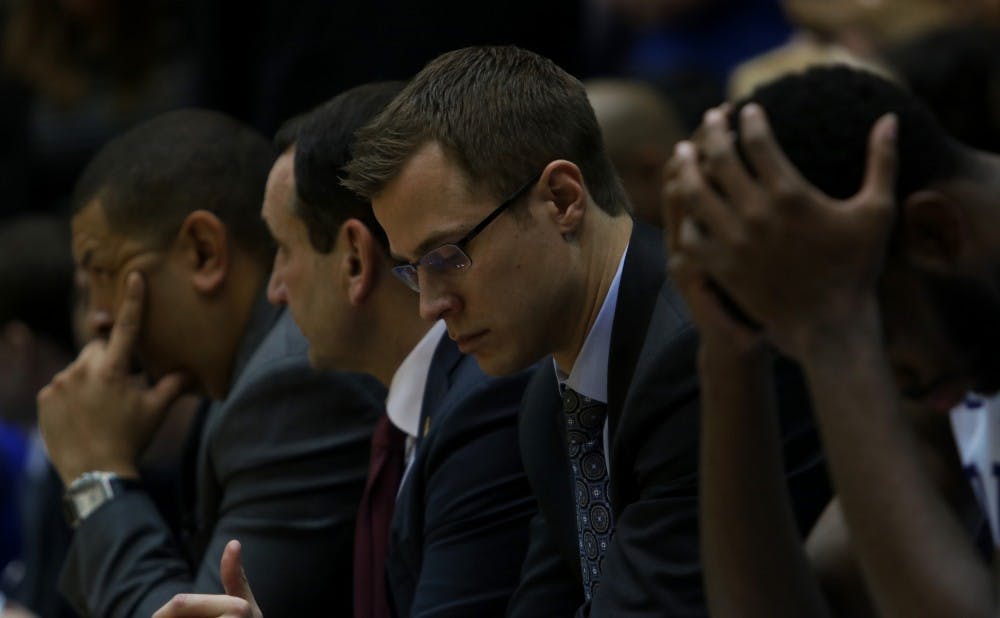 The Duke bench watched as Miami used a 9-0 run and a 10-0 run early in the second half to pull away from the Blue Devils and end the longest home-court winning streak in Division I.