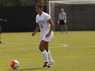 Freshman Kayla McCoy led the Blue Devils with three shots, but none found the back of the net as top-ranked Virginia dealt Duke its first ACC loss Sunday on the road.