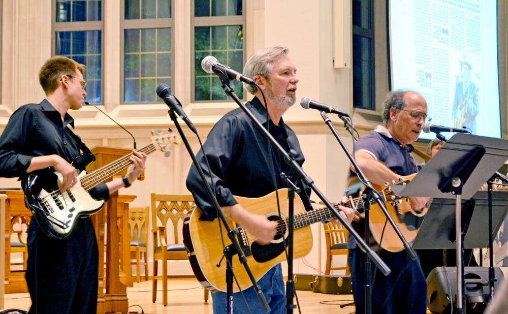 Faculty jam out to a repertoire of Bob Dylan songs at Goodson Chapel Thursday.