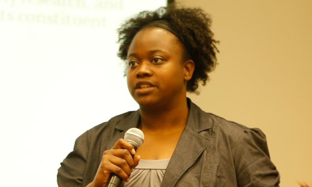 Former GPSC vice president Yuvon Mobley, a second-year graduate student in the department of molecular genetics and microbiology, speaks in front of the committee during elections Tuesday.