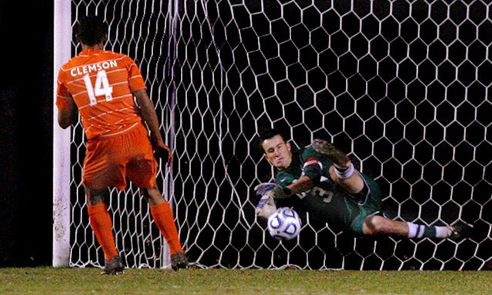 James Belshaw makes the game-winning save in penalty kicks against Clemson Tuesday night.