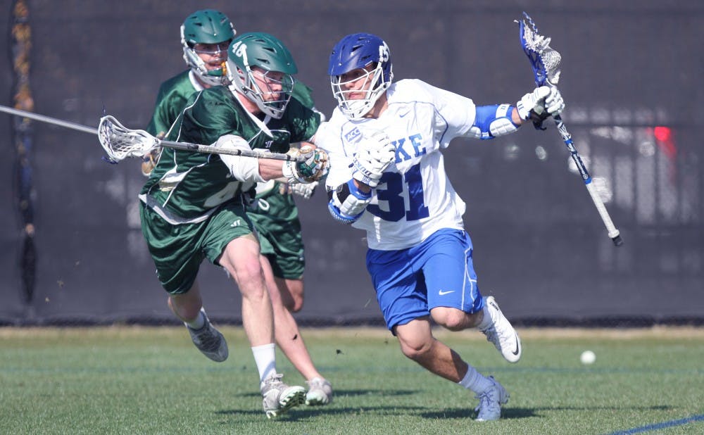 Senior Jordan Wolf scored two goals and added four assists as the Blue Devils defeated Jacksonville 16-10 in their season-opener.