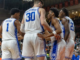 Duke men's basketball regroups in its game against Miami.