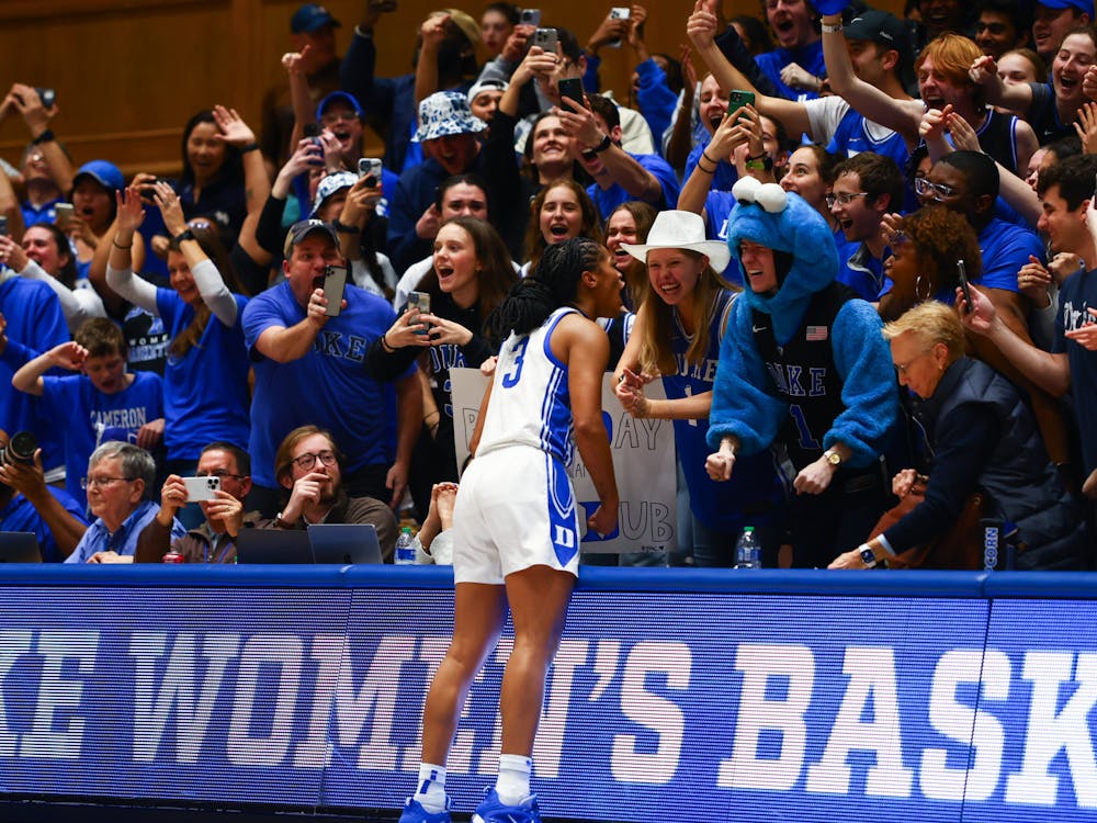 Ashlon Jackson celebrates with the Cameron Crazies after beating North Carolina.