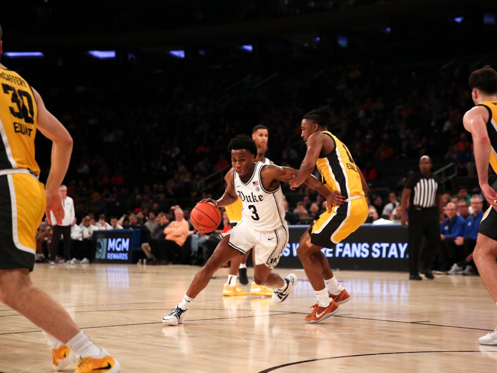 <p>Jeremy Roach drives during a career night against Iowa at Madison Square Garden in December 2022.</p>